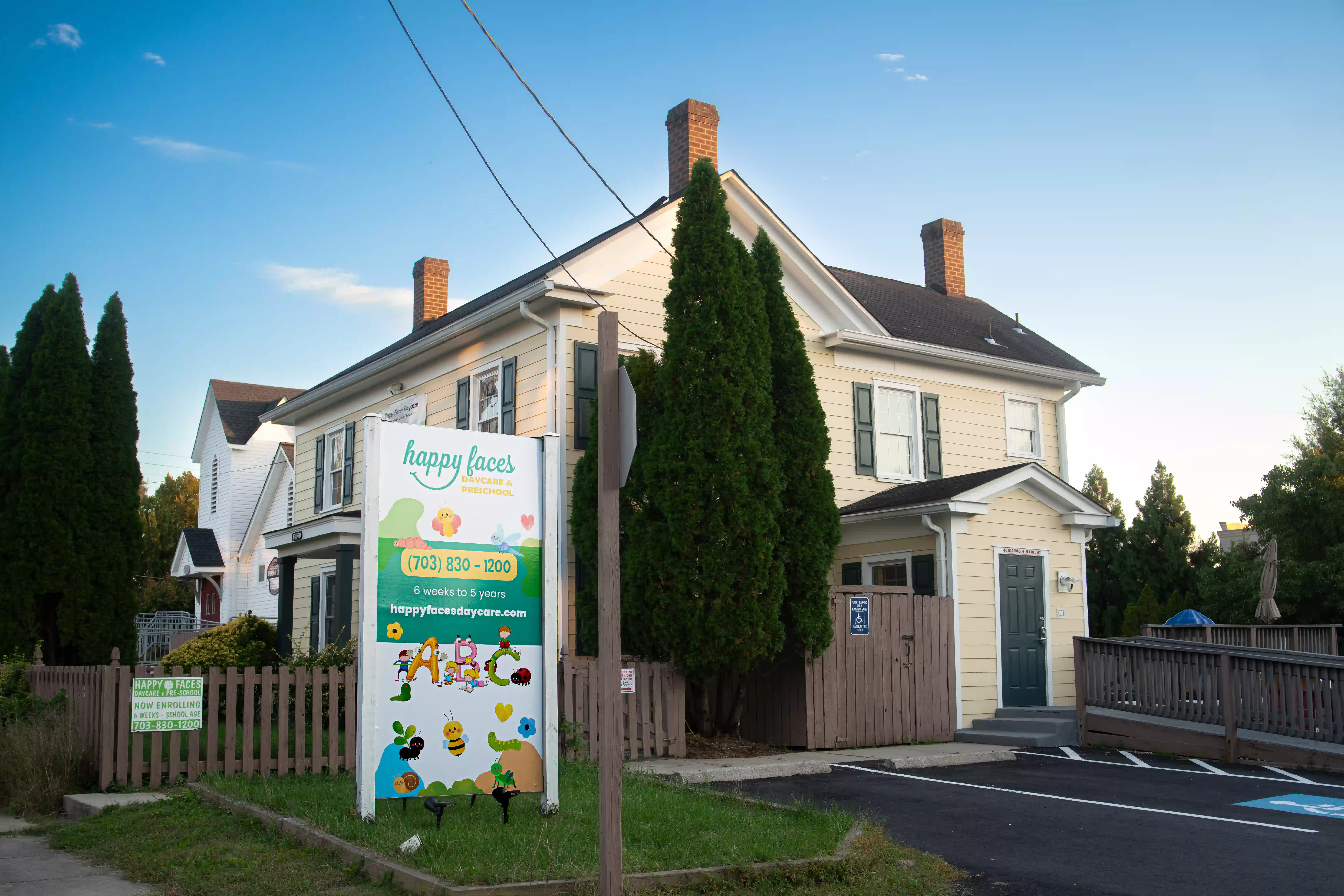 Happy Faces Daycare building exterior and playground in Centreville